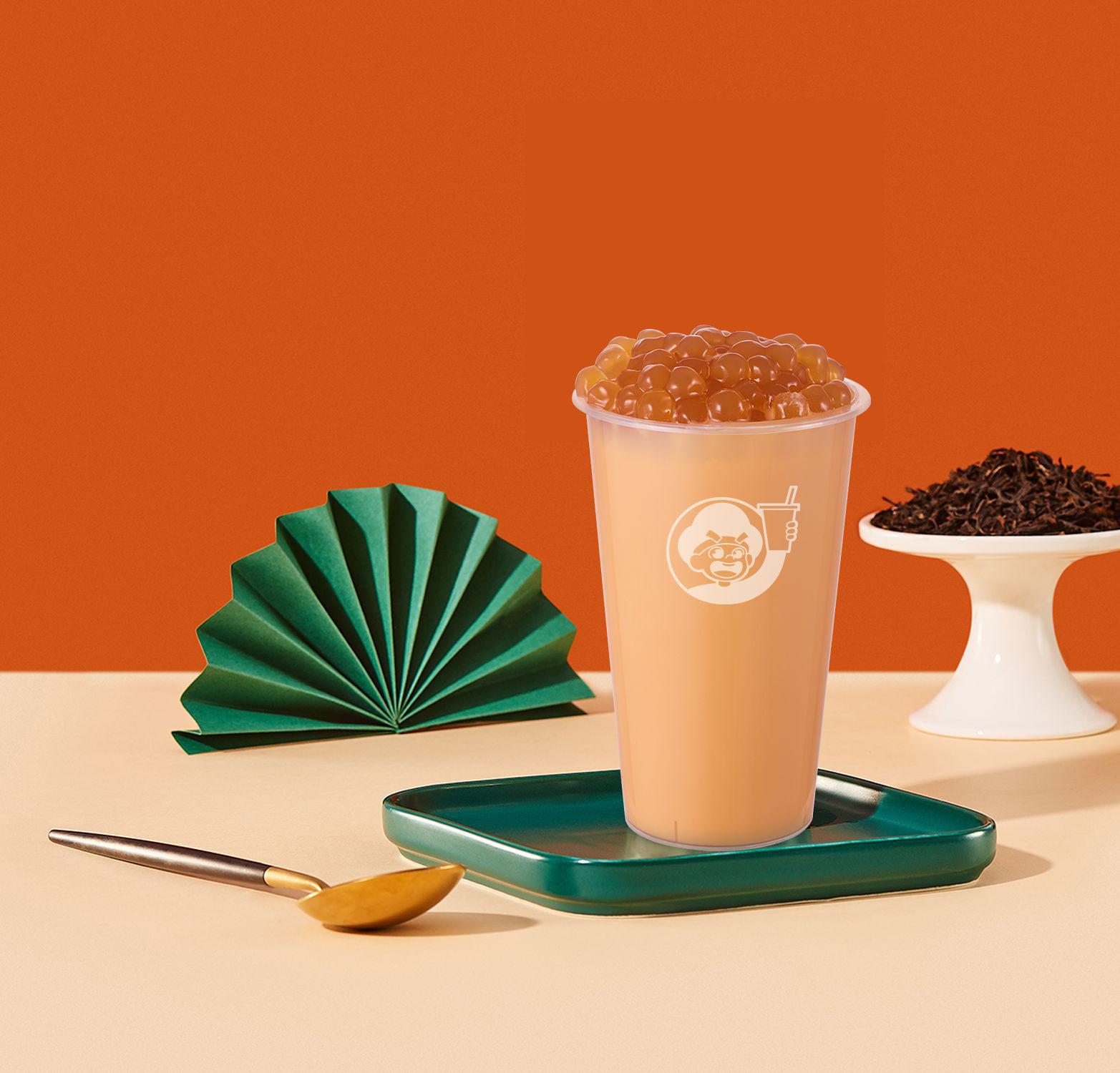 柒悦新茶状元红袍奶茶图片康师傅江南美食飞蓬草茶饮六必居奶茶图片